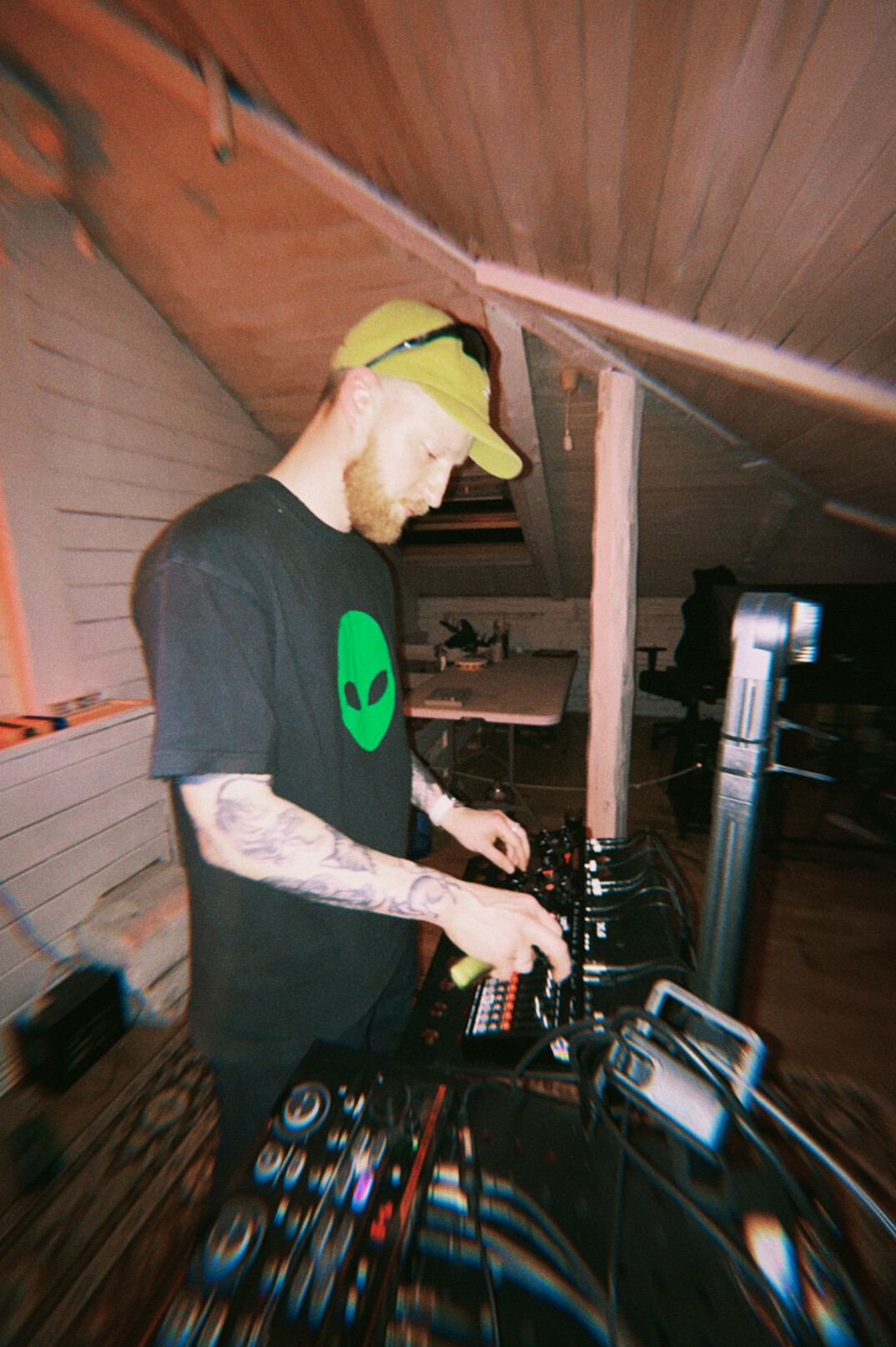 Audio mixing console with faders and meters in a sound control room
